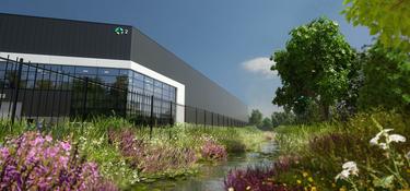 Rendering of the corner of a warehouse with a river and greenery infront.jpg